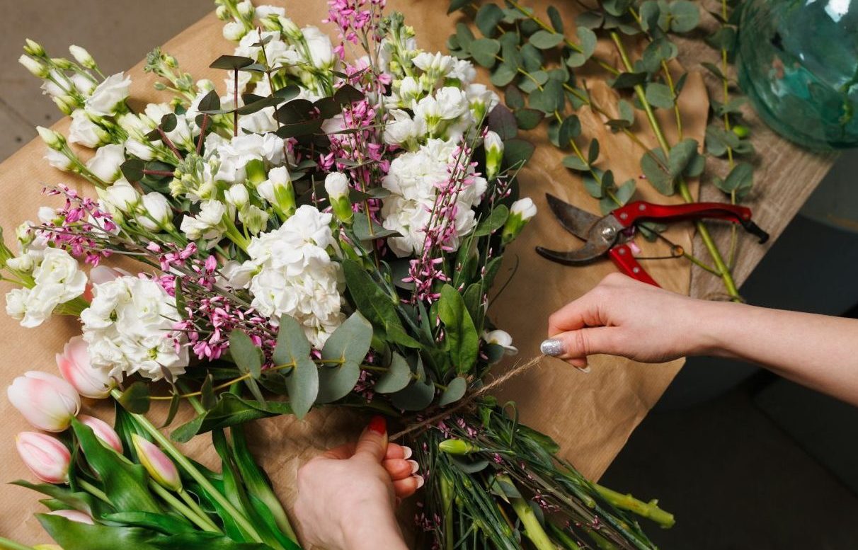 female-florist-makes-a-bouquet-in-a-flower-shop-spring-bouquet.jpg